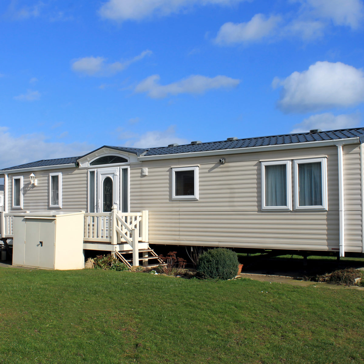 Cream caravan in trailer park