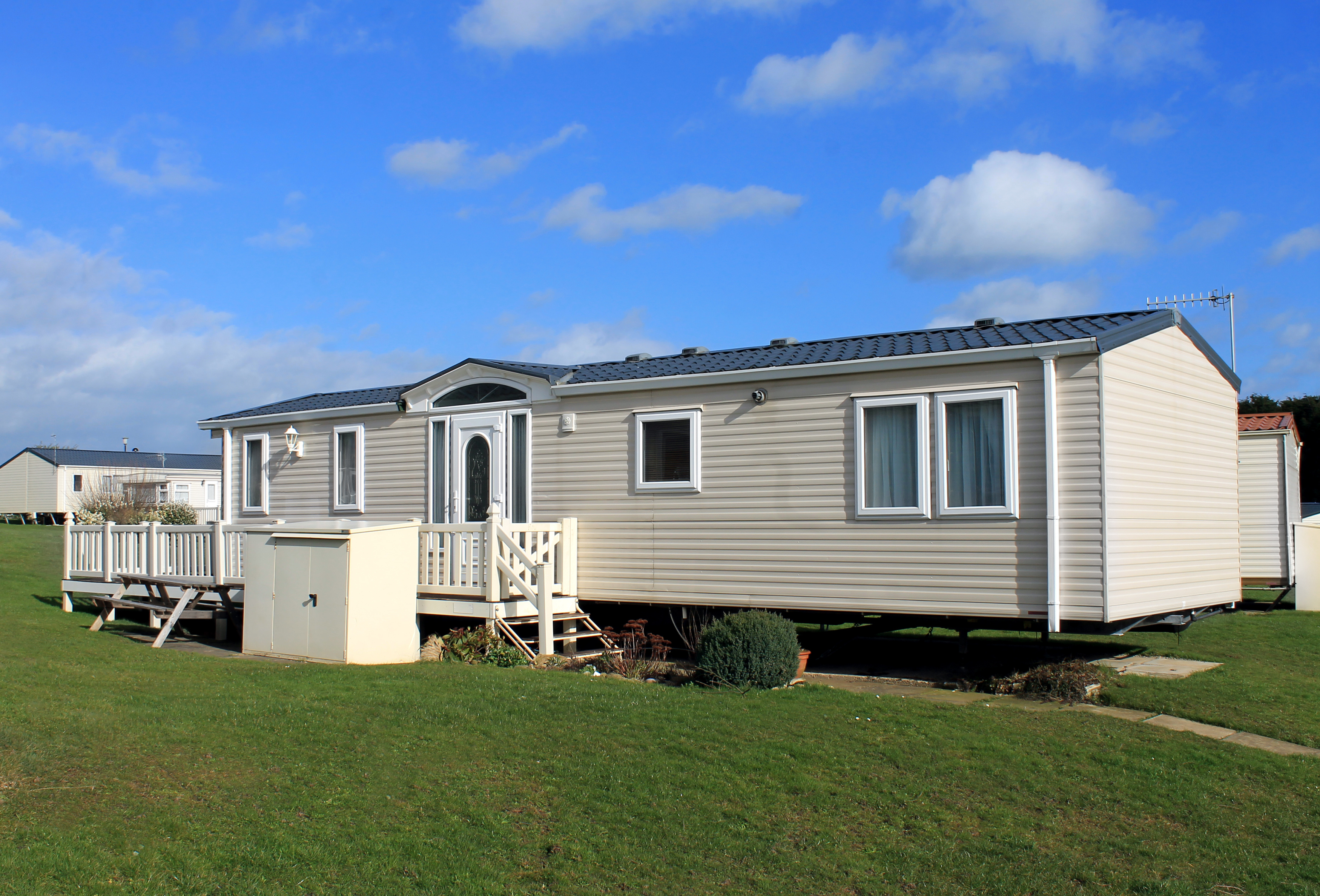 Cream caravan in trailer park